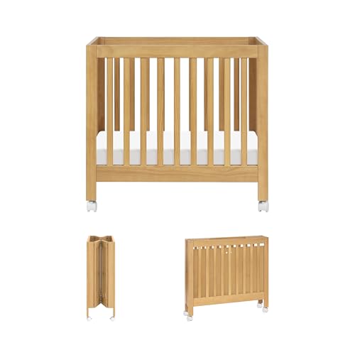 Image of Babyletto Origami Mini Portable Crib Folding with Wheels in Honey, 2 Adjustable Mattress Positions, Greenguard Gold Certified