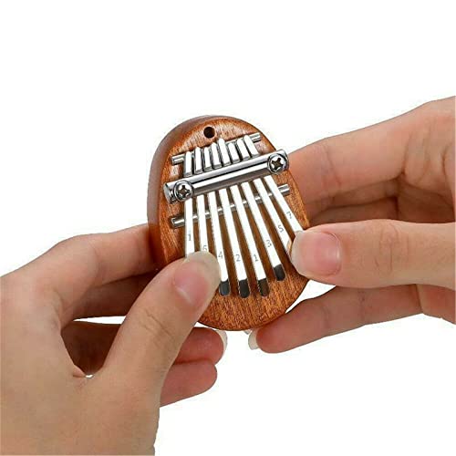 Qianderer Mini piano à pouce 8 touches Kalimba avec cordons, cadeau de Noël pour la famille, marron - Les Beatles, Paul McCartney, John Lennon, RIngo Starr, George Harrison Qianderer Mini piano à pouce 8 touches Kalimba avec cordons, cadeau de Noël pour la famille, marron – Image 5