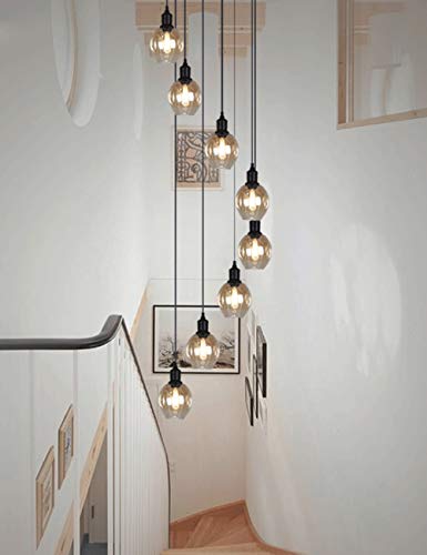 Lustre en spirale pour éclairer grand escalier sombre de villa 10 boules