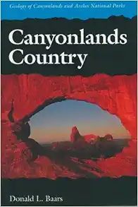 Cover includes a scene of rock formations as seen through a stone arch.