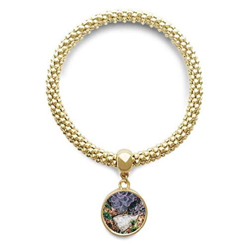 Bracelet fleur de pierre : finis les bijoux banals avec cette chaîne pendentif paysage d'or
