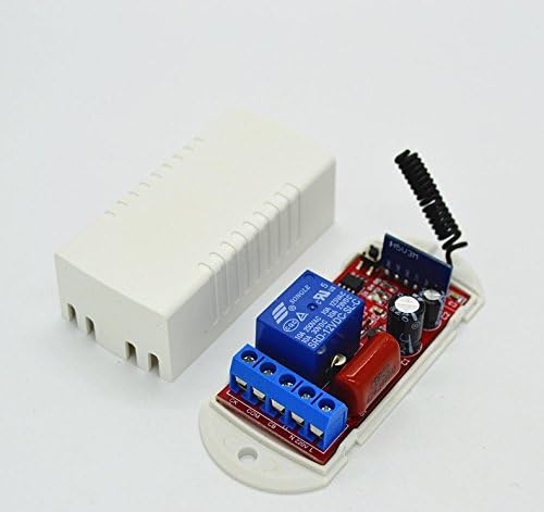 En angle view of the wireless smart switch module with its cover removed, showing the circuit board and the detached cover.