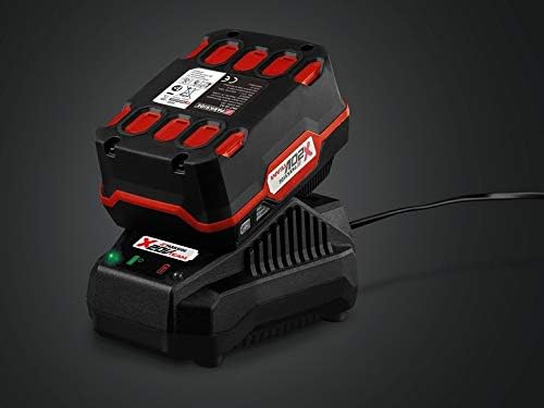 A PARKSIDE X 20 V Team lithium-ion battery being charged on its dedicated fast charger