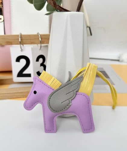 Image of NHCDFA 2PCS Bag Charms for Women, Leather Keychain Set with Angel Pegasus Design, Brown and Purple Color Combination for Handbags and Accessories, Two Pieces Included for Stylish Daily Use
