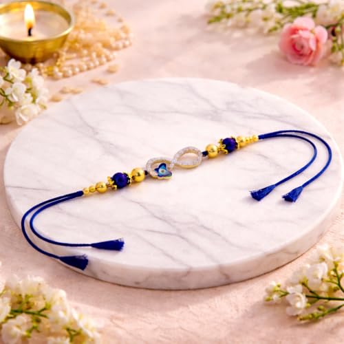 Image of JAIPUR ACE Elegant Infinity Rakhi Bracelet with Evil Eye Charm Premium Blue Thread Raksha Bandhan Rakhi for Brother, Gold Beads Designer Rakhi with Protective & Modern Stylish Look (Infinity Rakhi)
