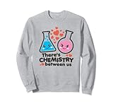 Perfecto para niños y niñas que aman la ciencia. Dice, hay química entre nosotros. Añádelo a tu día de San Valentín, Navidad y cumpleaños.