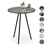 Materiales: el mosaico de cristal contrasta de forma elegante con las patas de metal