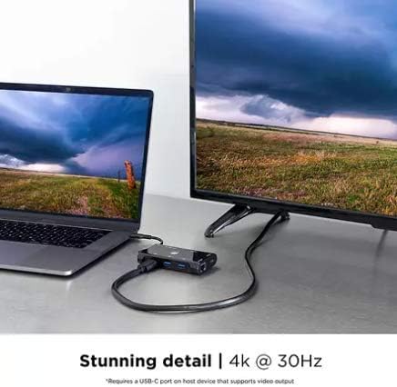 Laptop connected to an external monitor via the UltraPro Elite USB-C Multiport Hub's HDMI port, displaying 4K resolution