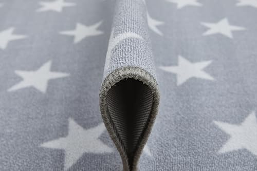 Tapis gris clair misento 100% polyamide aux finitions soignées