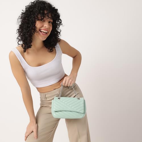 Image of Fastrack Casual Sling Bag with Magnetic Button for Girls, Medium Size with Internal Zipper, Made with Premium Faux Leather, Versatile and Durable Design