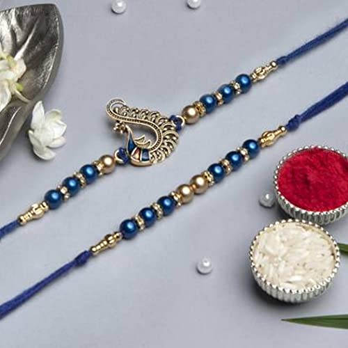 Image of eCraftIndia Set of 2 Blue & Golden Pearls and Peacock Designer Rakhis for Brothers with Chocolate, 2 Cadbury Dairy Milk, 2 Kitkat, Rakhi with Chocolate Gift - Roli Chawal Pack, Greeting Card