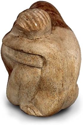 Hand carved wooden Teak wood hugging figures.