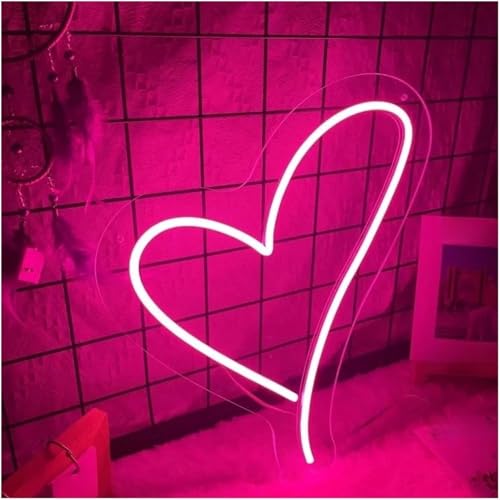 Enseigne lumineuse au néon Cœur rose pour éclairer un coin sombre triste