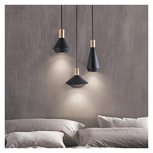 Lustre restaurant moderne au-dessus de la table pour une ambiance conviviale