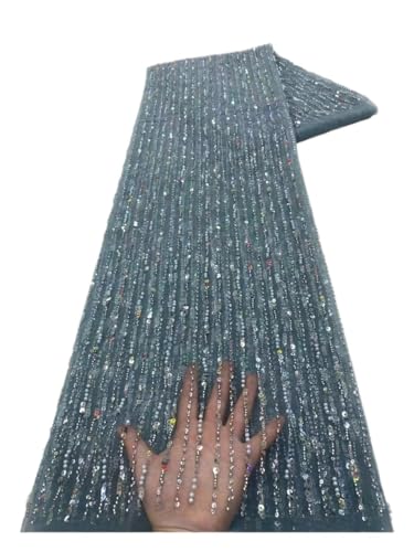 Tissu en dentelle à paillettes bleu pour réussir une robe de mariée ou décoration maison