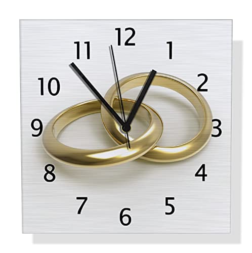 Wallario Design Wanduhr Zwei goldene Eheringe in Nahaufnahme auf weißem Grund aus Aluverbund, Alu-Uhr Größe 30 x 30 cm, Schwarze Zeiger mit Metalloptik