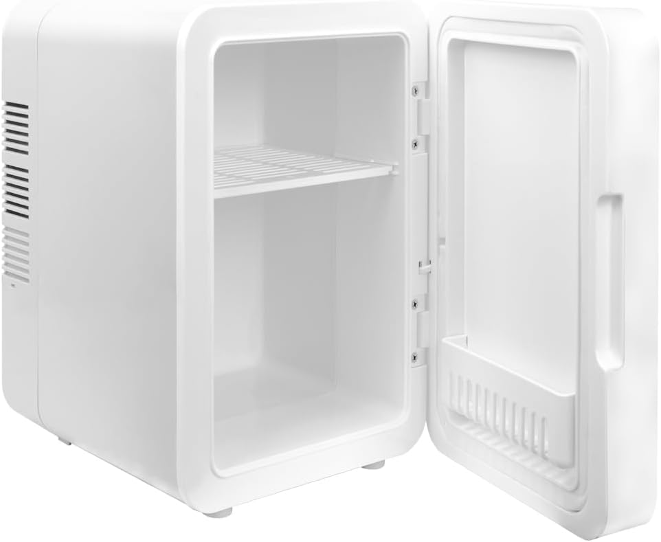 Interior view of the empty Jocca Mini Refrigerator with the door open.
