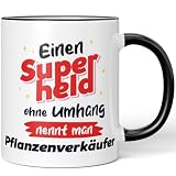 JUNIWORDS Tasse, Einen Superhelden ohne Umhang nennt man Pflanzenverkäufer, Schwarz (7534152)