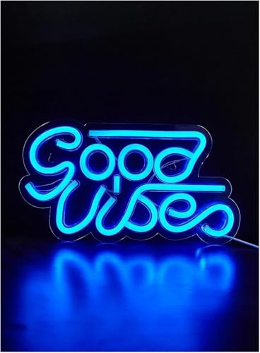 Enseigne au néon Good Vibes pour transformer un mur blanc triste en déco de chambre chaleureuse