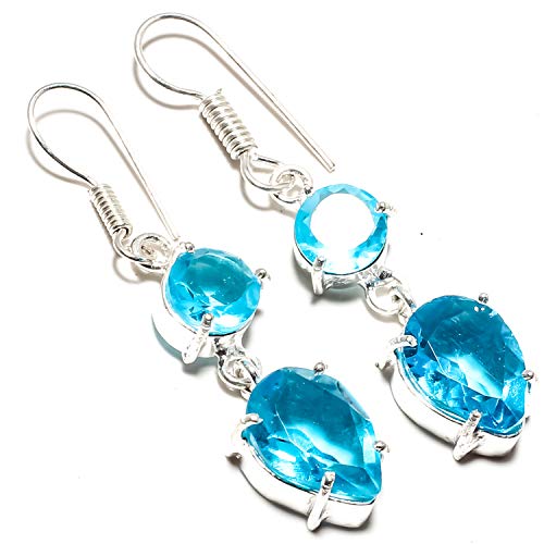 Boucle d'oreille topaze bleue artisanale en argent 925 de haute joaillerie