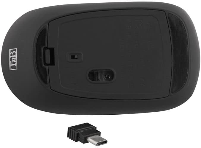 Metter il fondo a view of the T'nB MWTCBK Wireless USB-C Mouse showing the battery compartment and the USB-C receiver slot.