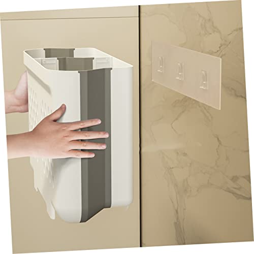 Panier à linge pliable gain de place pour optimiser le rangement d'une petite salle de bain