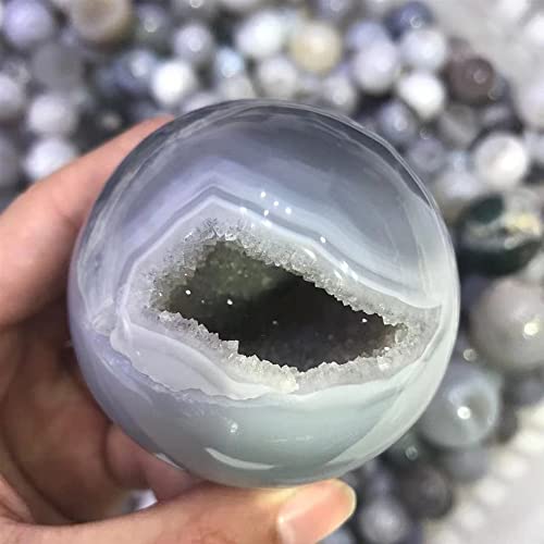 Pierre de cristal en boule d'agate transparente d'exception avec géode naturelle