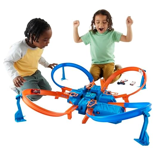 Hot Wheels Toy Car Track Set, Criss Cross Crash with 1:64 Scale Vehicle, Powered by a Motorized Booster [Amazon Exclusive]