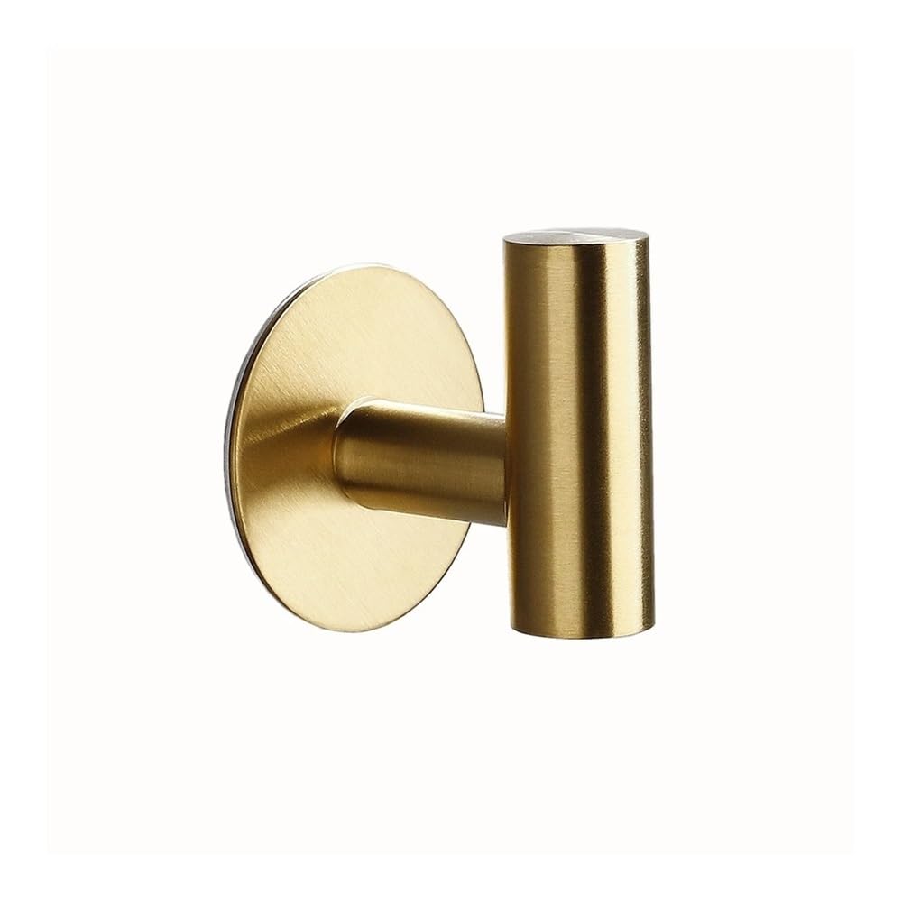 Perchero de pared para un baño ordenado con perchas modernas doradas