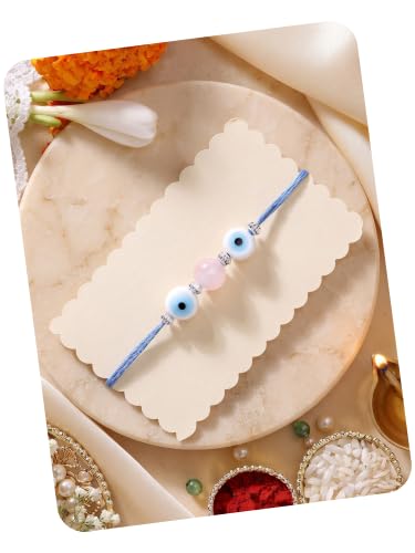 Image of Karatcart Elegant Pink Bead Handmade Evil Eye Rakhi for Brother with Roli & Chawal