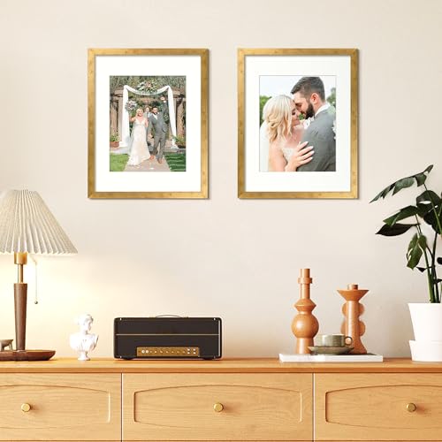 Image of upsimples 11x14 Picture Frame, Display Pictures 8x10 with Mat or 11x14 Without Mat, Wall Hanging Photo Frame, Bronze, 1 Pack