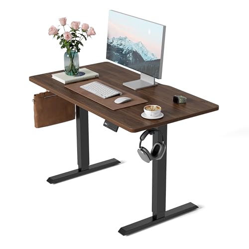 FEZIBO Electric Height Adjustable Standing Desk with digital display control panel, 60x100cm Ergonomic Home Office Table for sit stand with Splice Board & Black Walnut Wood Grain Surface.