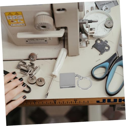 Cinta métrica mini retráctil 1 m con llavero miniatura 6