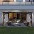 SHPAI 12’ x 14’ Lean to Gazebo, Outdoor Wall Mounted Gazebo Aluminum Frame, Hardtop Pergola with Galvanized Steel Sloping Roof for Patio Deck Garden Backyard, Curtain and Netting Included