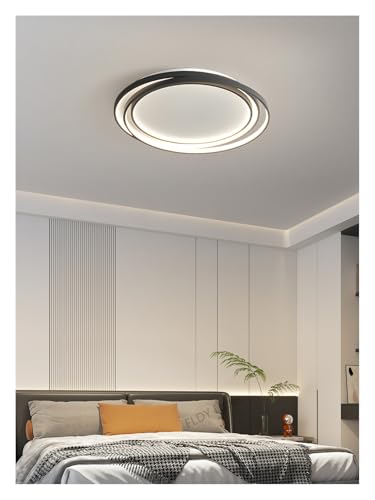 Plafonnier moderne circulaire noir pour l'ambiance cocooning du salon