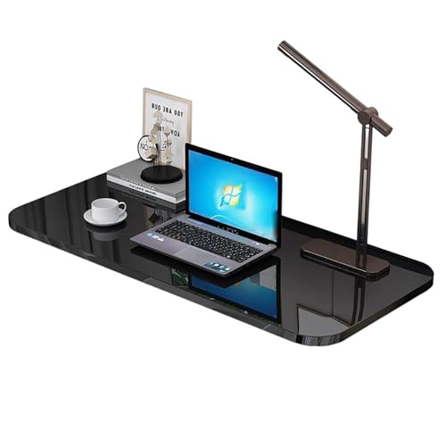 Bureau mural pliable flottant noir pour optimiser les petits espaces