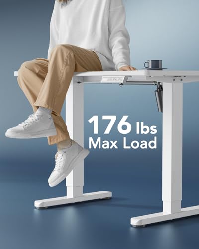 Image of HUANUO Electric Small Standing Desk, Whole Piece Desktop, Adjustable Height Computer Desk, 4 Height Memory Settings, Sit Stand Up Desk for Home Office, 35 inch x 20 inch, White