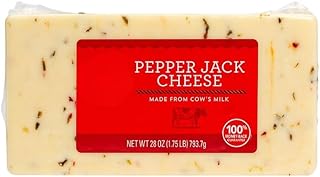 Monterey Jack cheese block is studded with fiery bits of hot pepper and ...