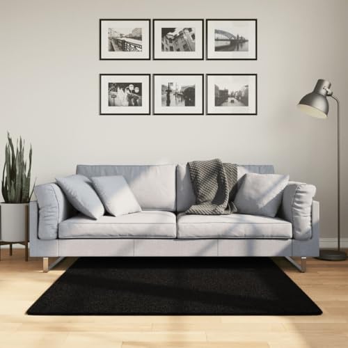 Tapis aspect fourrure moderne et résistant en polyester noir