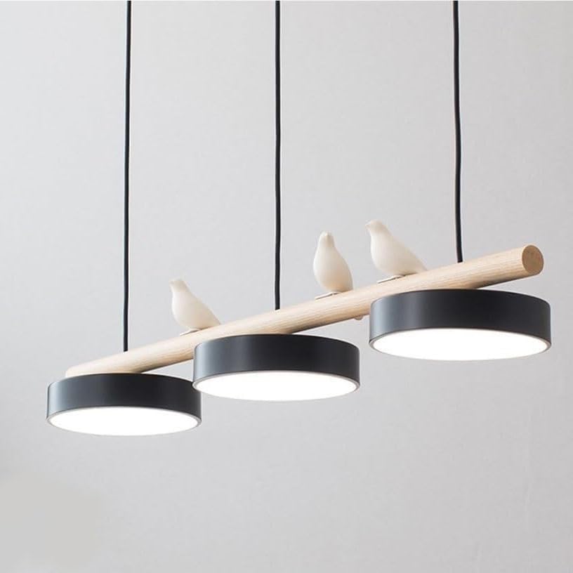Suspension 3 lumières pour éclairer un îlot de cuisine sombre en style industriel