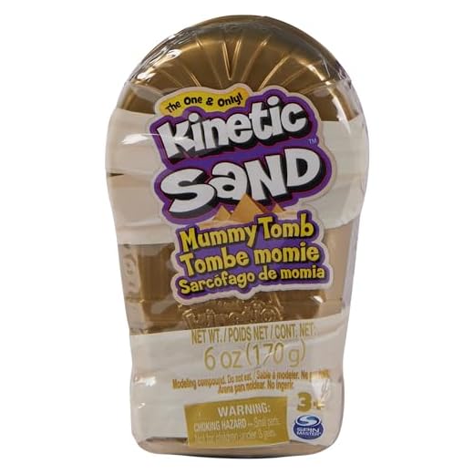 Kinetic Sand, Mini Mummia, 170 g di Sabbia Magica, Sabbia cinetica Marrone, 1 formina Personaggio a Sorpresa, 2 Accessori e 3 Gemme Incluse, Giocattoli per Bambini e Bambine 3 Anni