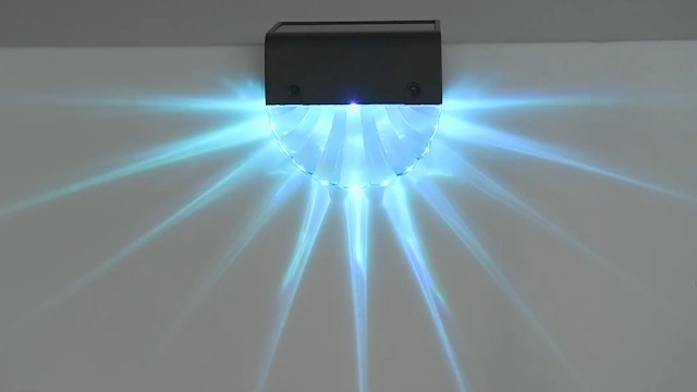 Creëer een sfeervolle tuin met solar wandlampen aan je schutting