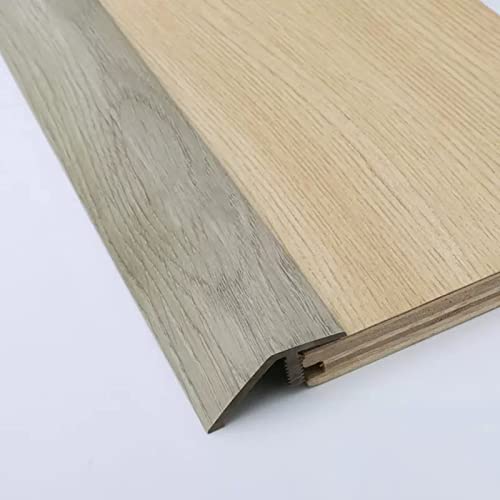 Transition de plancher en PVC effet bois pour sécuriser le seuil de porte de votre maison
