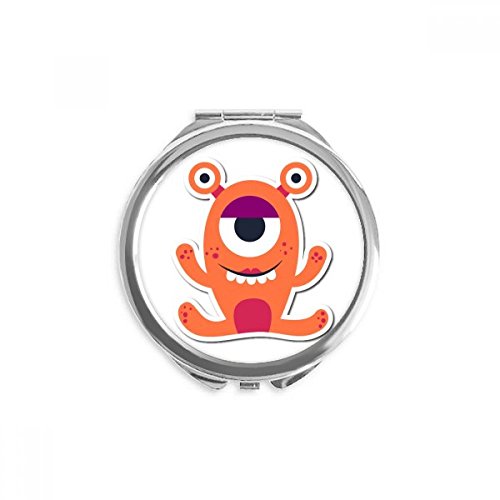 Espejo redondo portátil para retocar tu maquillaje con diseño de Alien Monster naranja