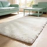 🪶【Ultra Doux】Le tapis de salon moderne est incroyablement doux et dispose d'une couche de finition en matériau épais et hirsute. Très doux au toucher, ne coule pas et ne se décolore pas. Disponible dans une variété de couleurs et de tailles, il y en a toujours une pour vous.