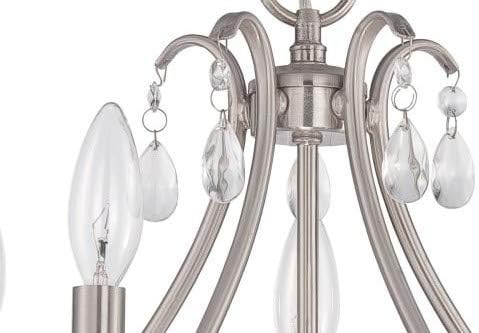 Close-up of chandelier light socket and crystal accent