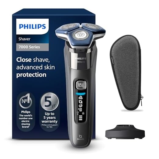 Philips Shaver Series 7000 - Rasoio elettrico da uomo, umido e asciutto, con tecnologia SkinIQ, rifinitore a scomparsa, base di ricarica, custodia da viaggio e spazzola di pulizia