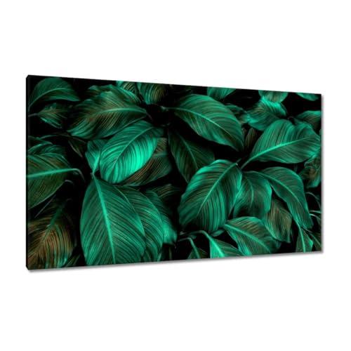 Tableau sur toile 120 x 70 cm feuilles turquoise pour habiller un grand mur vide avec élégance