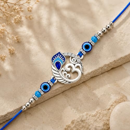 Image of Riddhika Ventures Alluring Gold Plated Om and Pearl Rakhi with Roli Chawal & Greeting Card for Men (R1)
