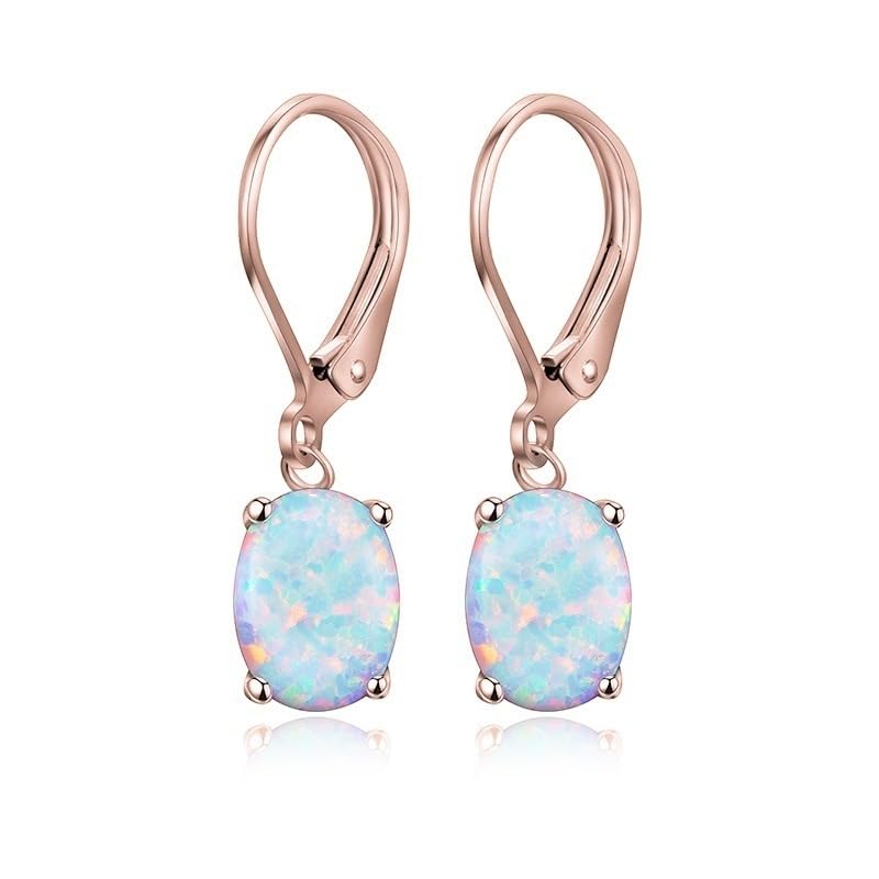 Boucles d'oreilles opale de feu pendantes en or rose du bureau aux soirées